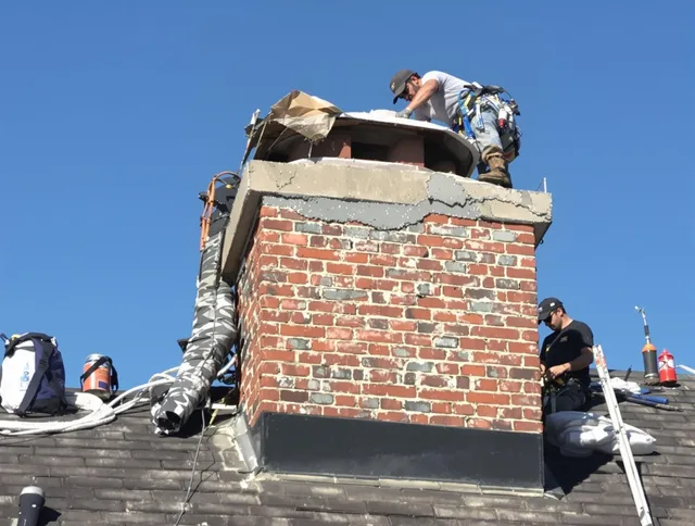 Alhambra Chimney Sweep installing a custom chimney crown in Alhambra, CA